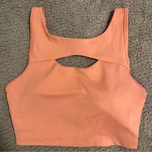 Peach sports bra/crop top with cutout